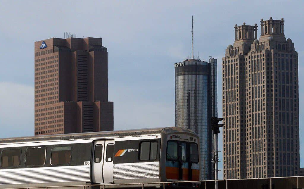 MARTA train driving past buildings in Atlanta, Georgia