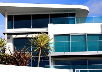 Small modern condo with palm trees