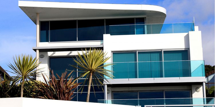 Small modern condo with palm trees