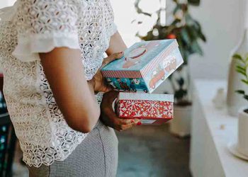 Person holding gifts behind back