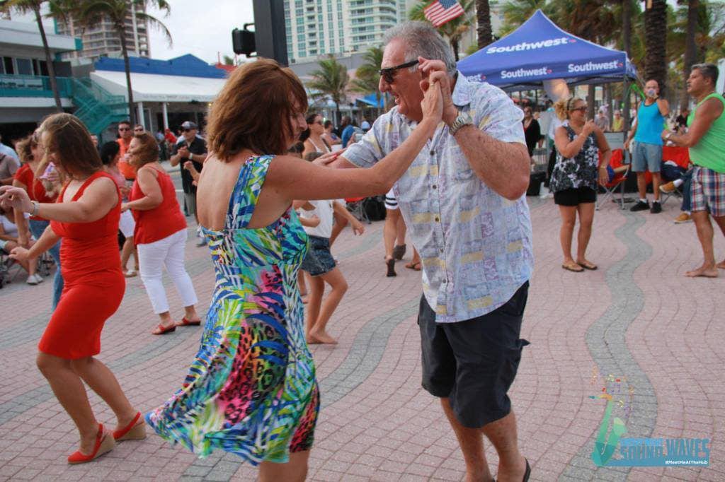 couple dancing outside at Fort Lauderdale