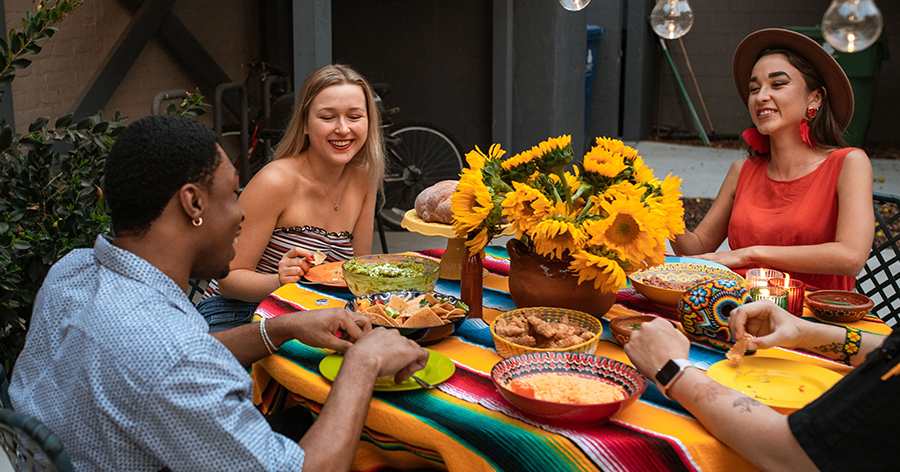 People sitting at a table eating