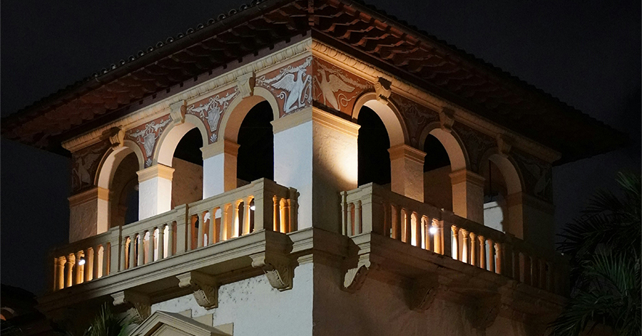 A building at night with the lights turned on