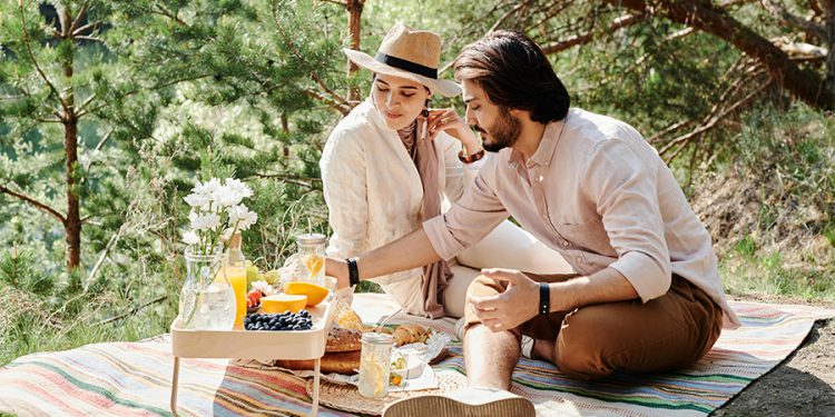 Man and woman having a picnic