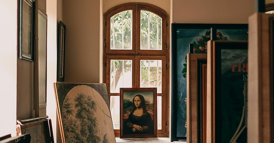Several paintings in a room