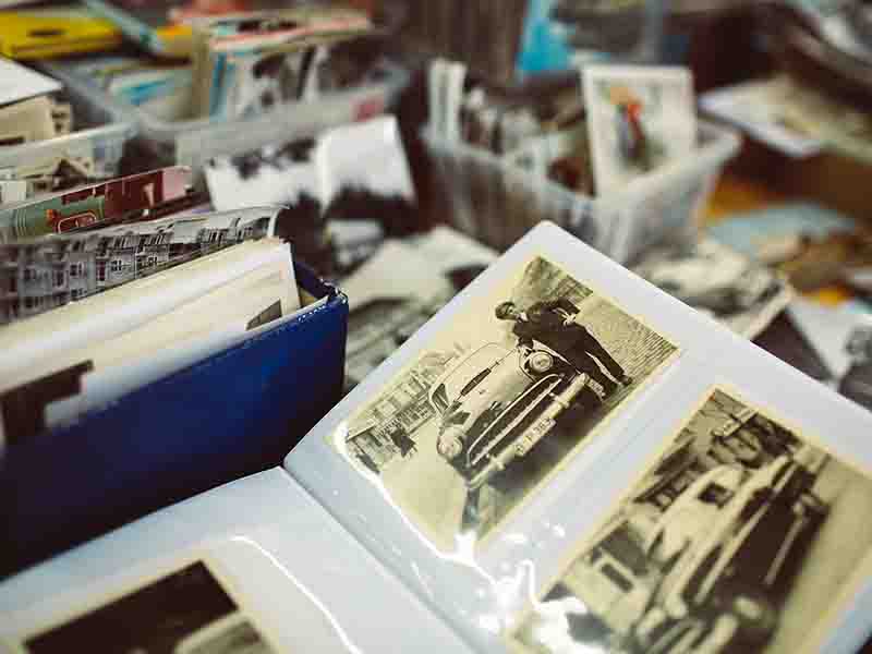 Antique photos in albums and boxes.