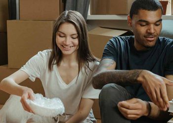 Couple packing up their kitchen items