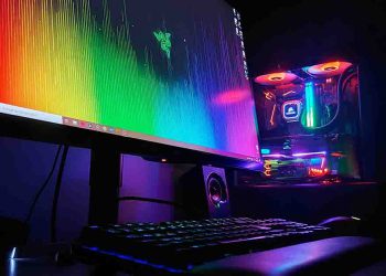 PC monitor with rainbow lights and other gaming implements