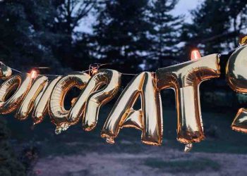 Congrats written in golden balloons