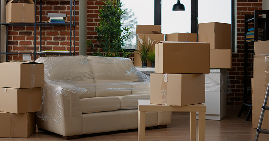 Room with couch and boxes