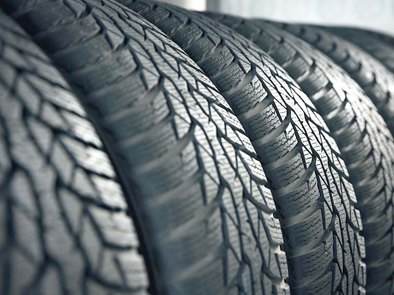 Car tires at automotive shop