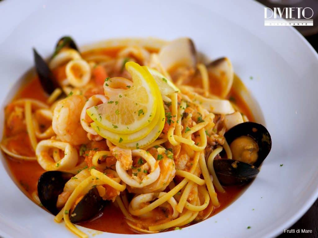Linguine pasta topped with shrimp, mussels, clams, calamari from Divieto Ristorante in Doral, FL