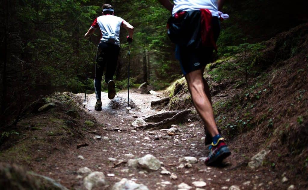Two men running as an outdoor activity