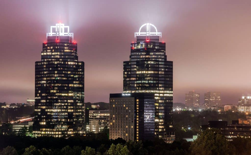 The King and Queen buildings in Atlanta lit up at night