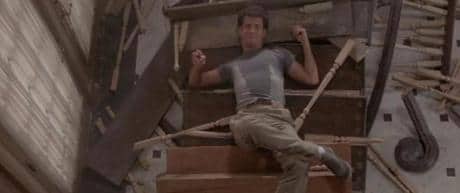 basementsmoneypit Man lying on the bottom of a staircase covered in tubes