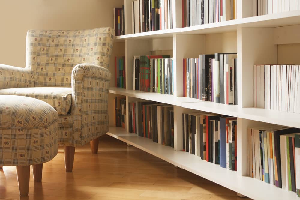 books on a white shelf