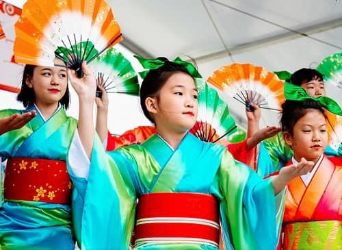 girls dressed in traditional Japaense outfits at the Japanese Festival in Houston