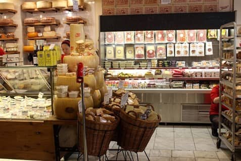 inside murray's cheese shop on Bleecker street in NYC