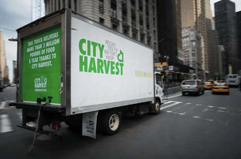 City Harvest truck driving through New York City