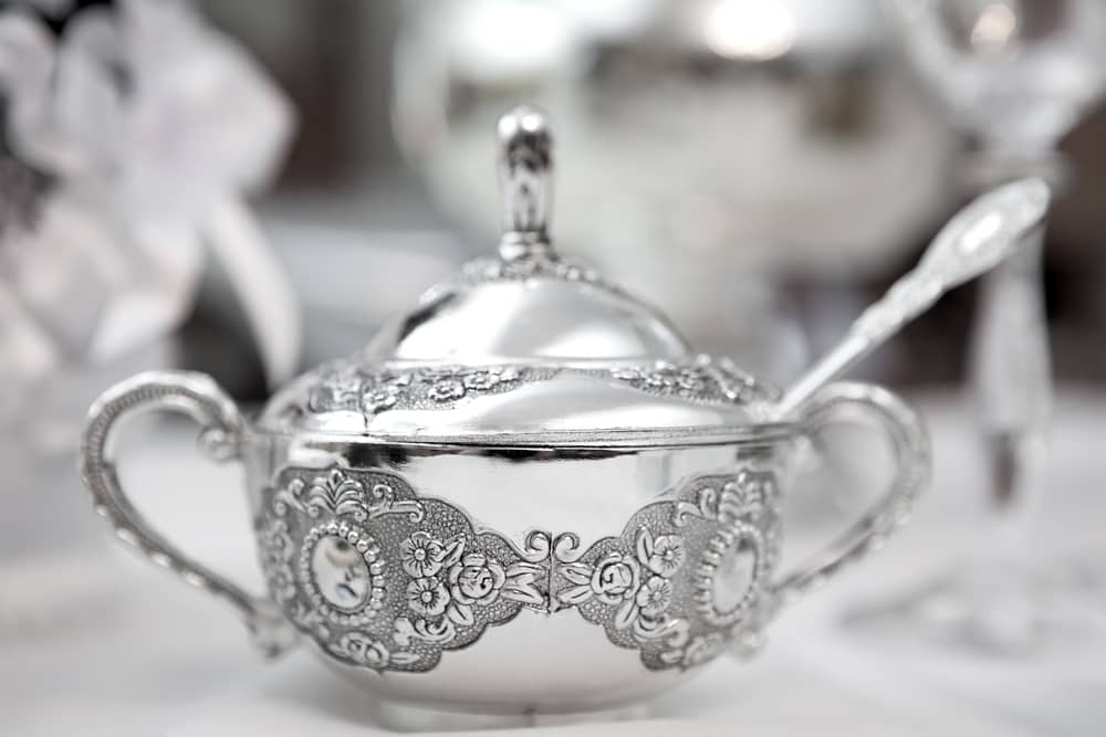 silver sugar bowl with spoon