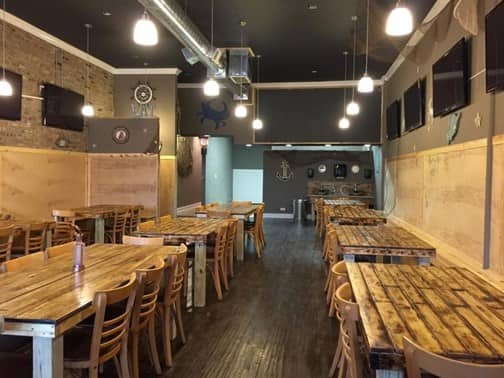 seating area and tables at The Angry Crab in Chicago